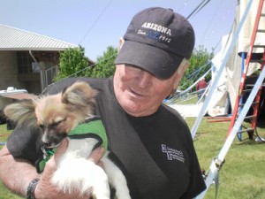 A study in contrasts-Squirrel is pretty much fully free shaped being held by Rudy of the Zoppe Family Circus, a traditional trainer.  Rudy offered to take Squirrel over and over.